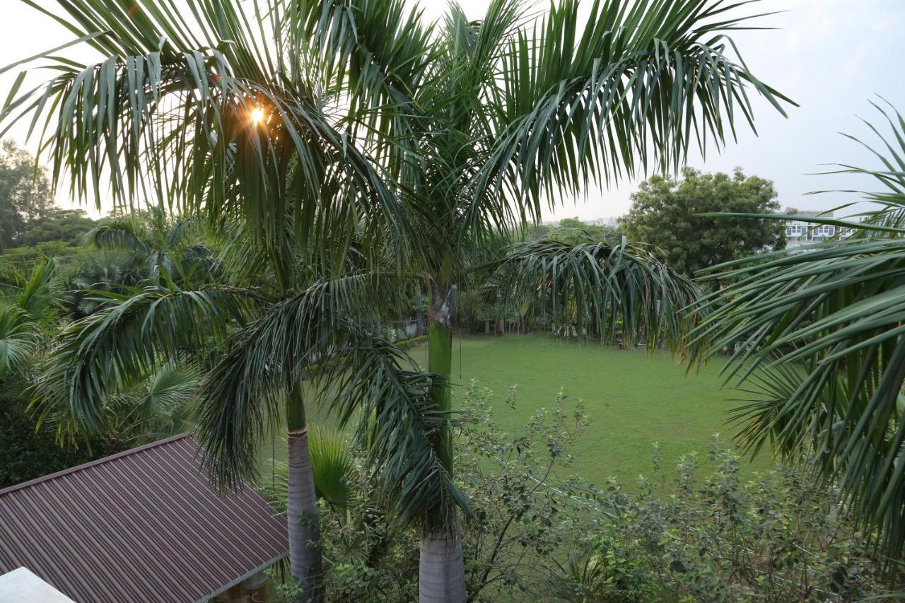 Mann The Palm Retreat Hotel Lucknow Bagian luar foto